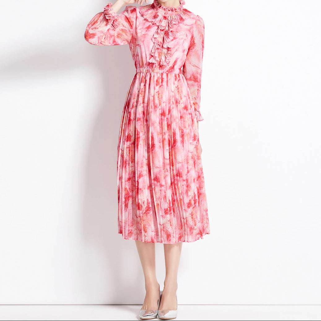 Front detail of the dress's cinched waist and floral print pattern
