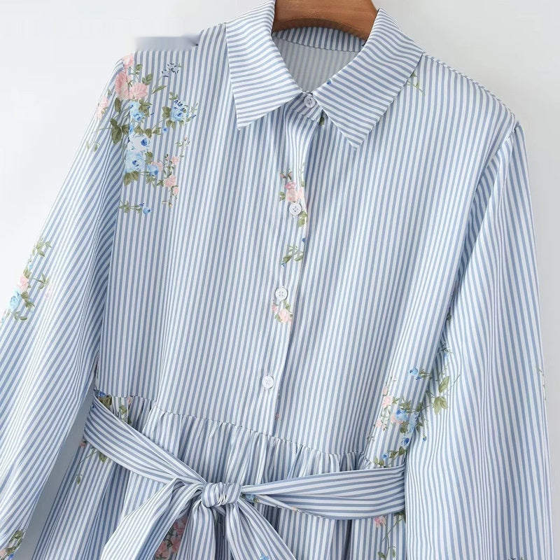 Side profile of dress displaying sleeve length and printed design placement