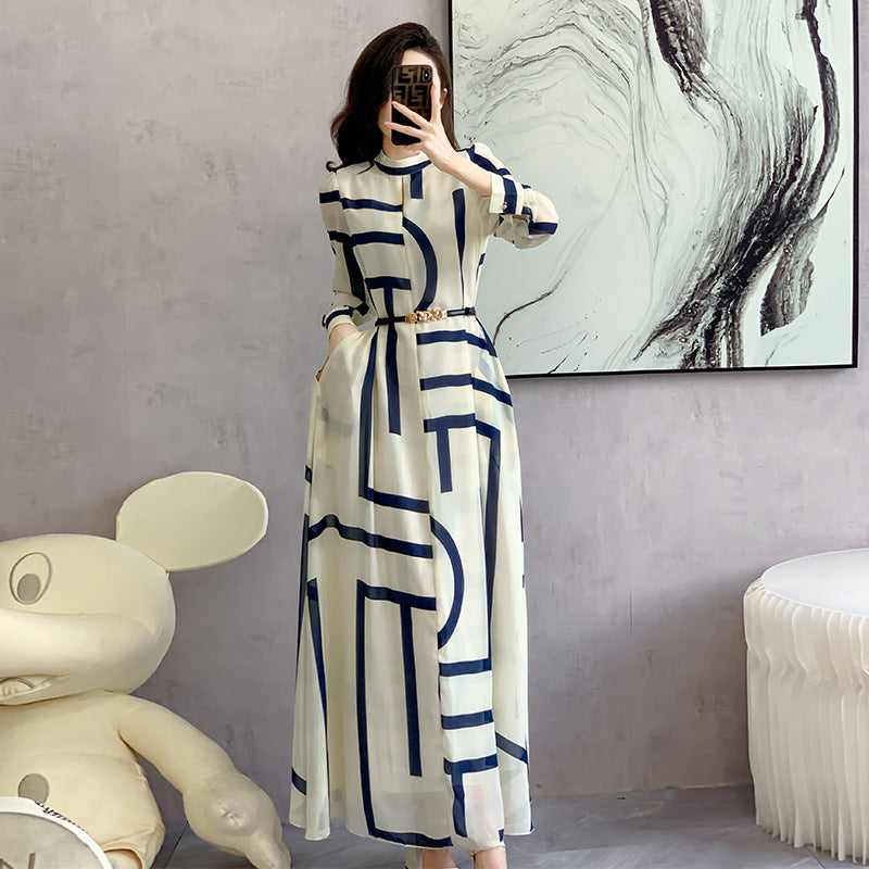 Full-length front view of burgundy maxi dress on model from feet to shoulders