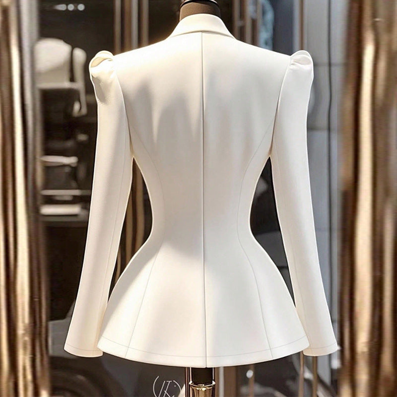 Front view of blazer worn open showing structured lapels and draping