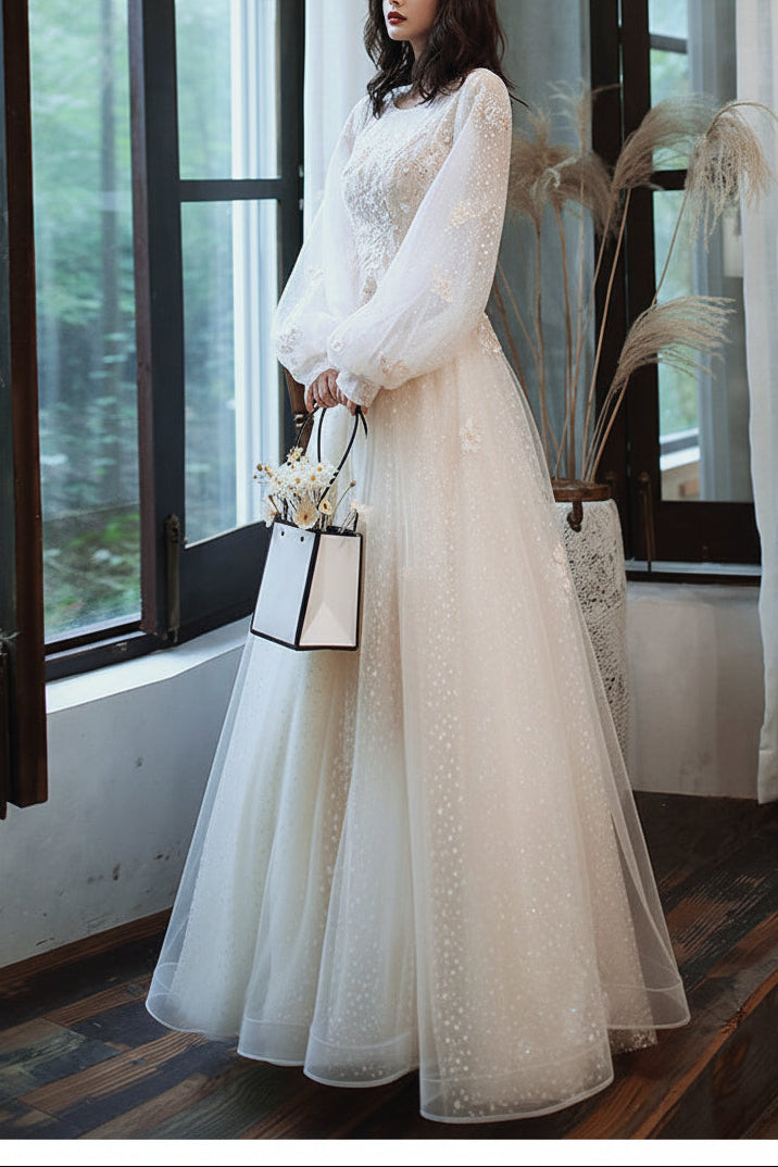 Full-length front view of burgundy gown on dress form