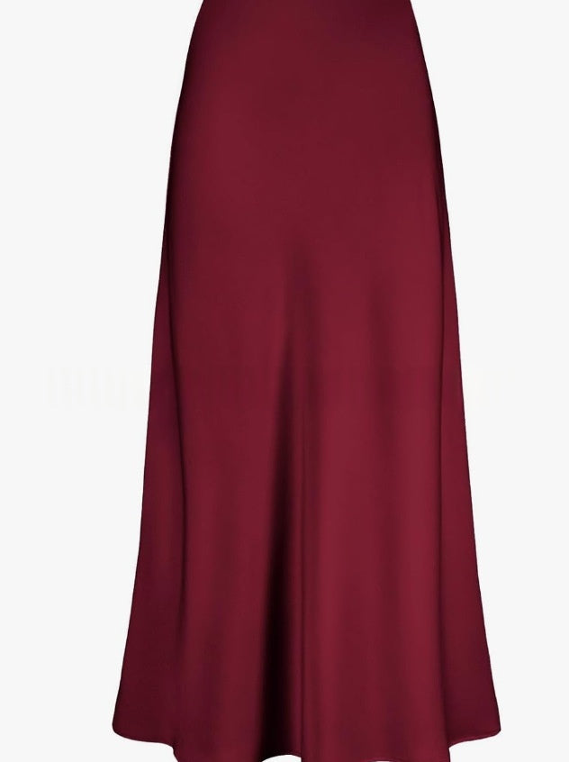Flat lay arrangement showing complete midi skirt dimensions