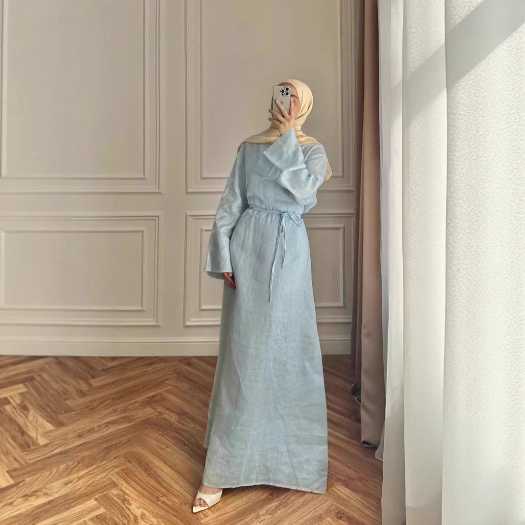 Front view showing dress neckline, sleeve length, and overall modest styling