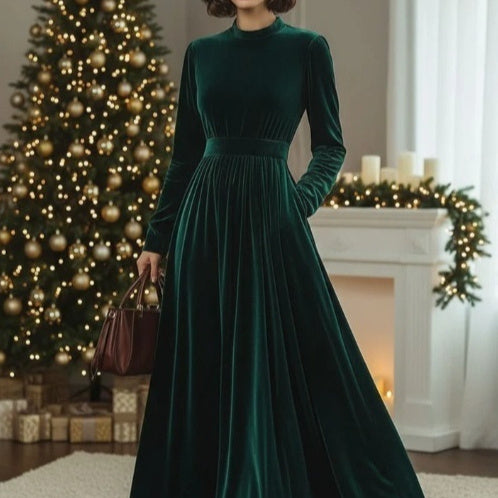 Back view of burgundy maxi dress showing pocket detail and floor-length hem