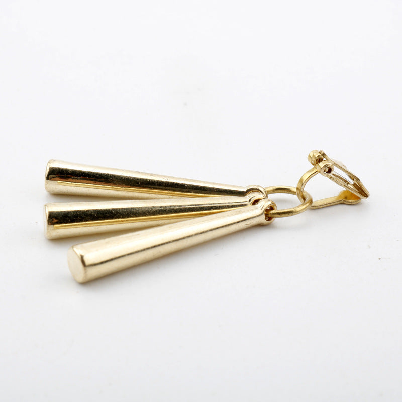 Close-up of earring top loop and clip attachment point