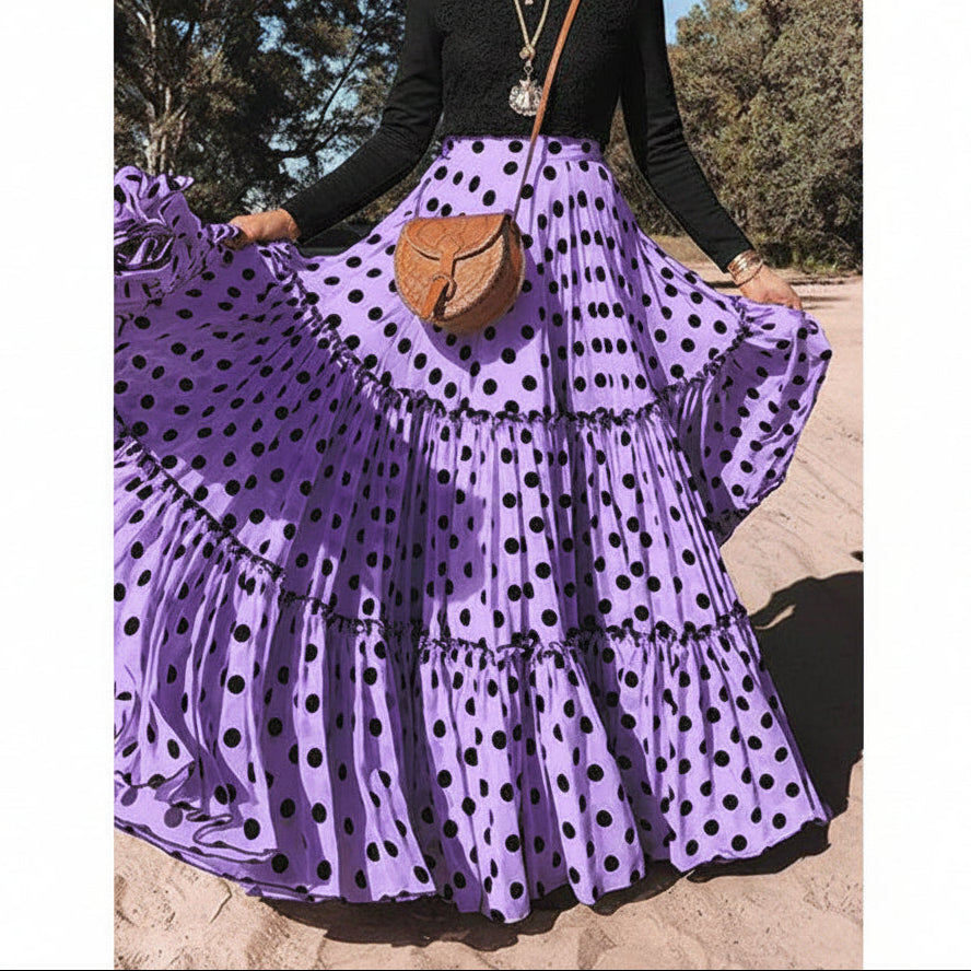 Side profile of polka dot maxi skirt displaying flowing silhouette