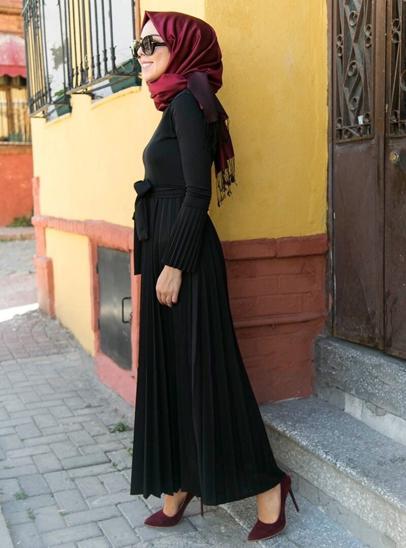 Back view showing full length and relaxed silhouette of dress
