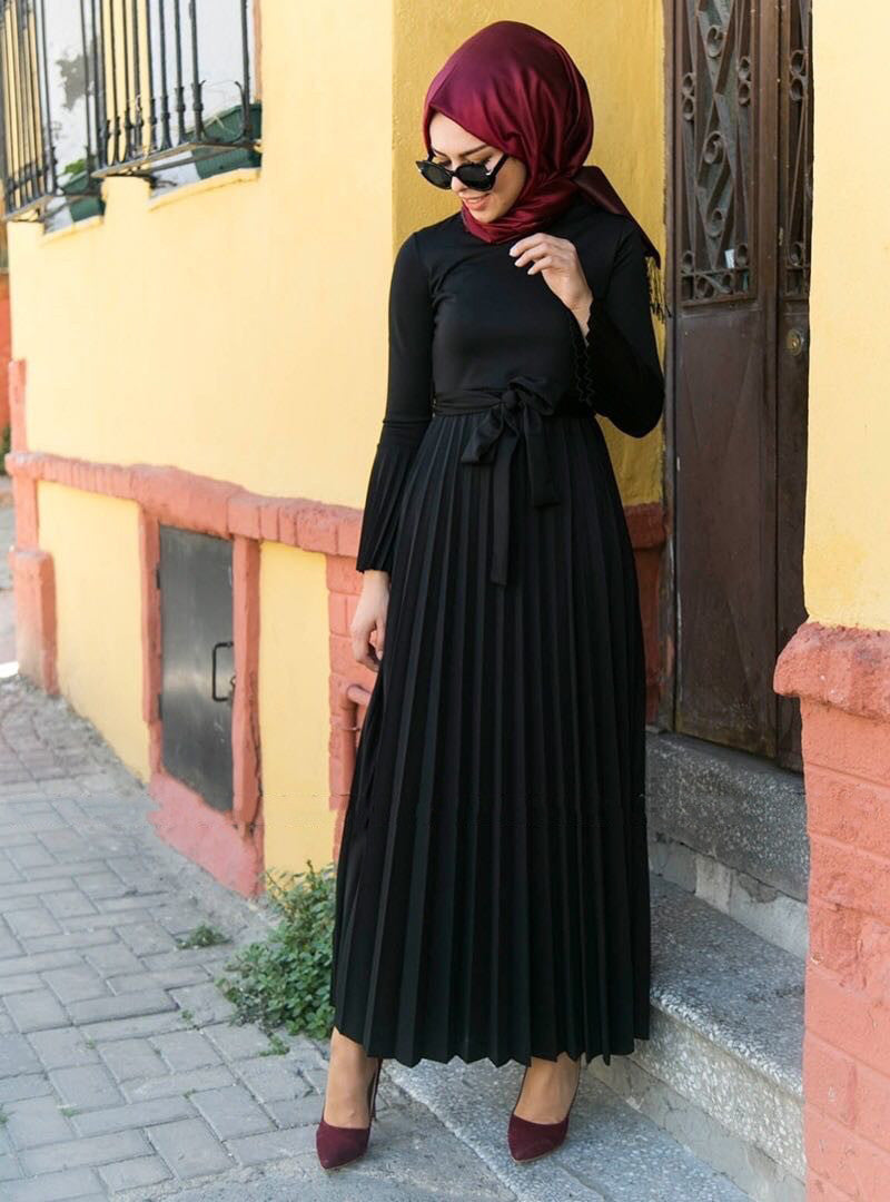 Full-length pose showing how dress falls and moves when worn