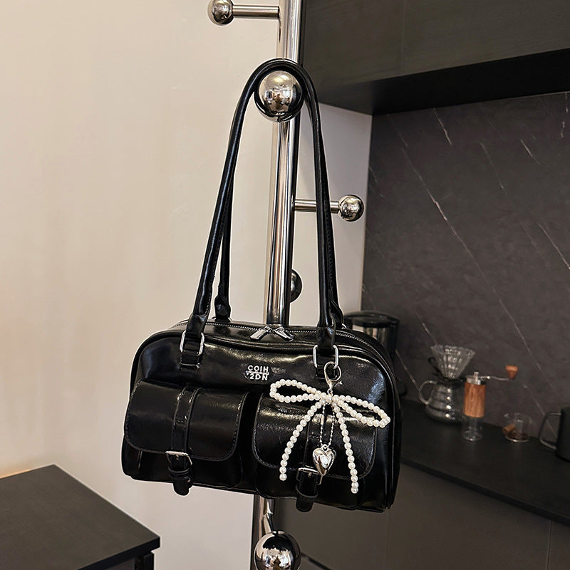 Back view of shoulder bag displaying clean exterior surface