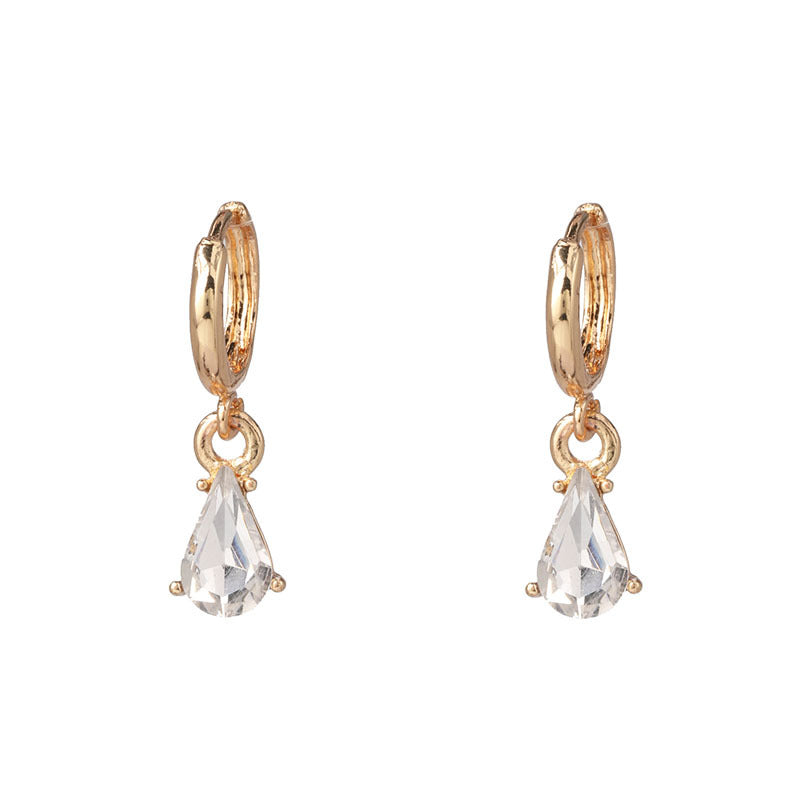 Back view of gold glitter earrings displaying closure and construction