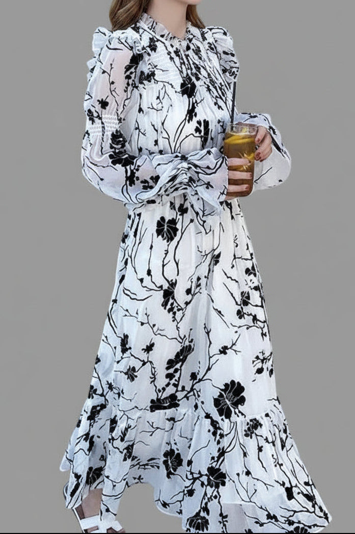 Close-up of delicate floral print and ruffled chiffon fabric detail
