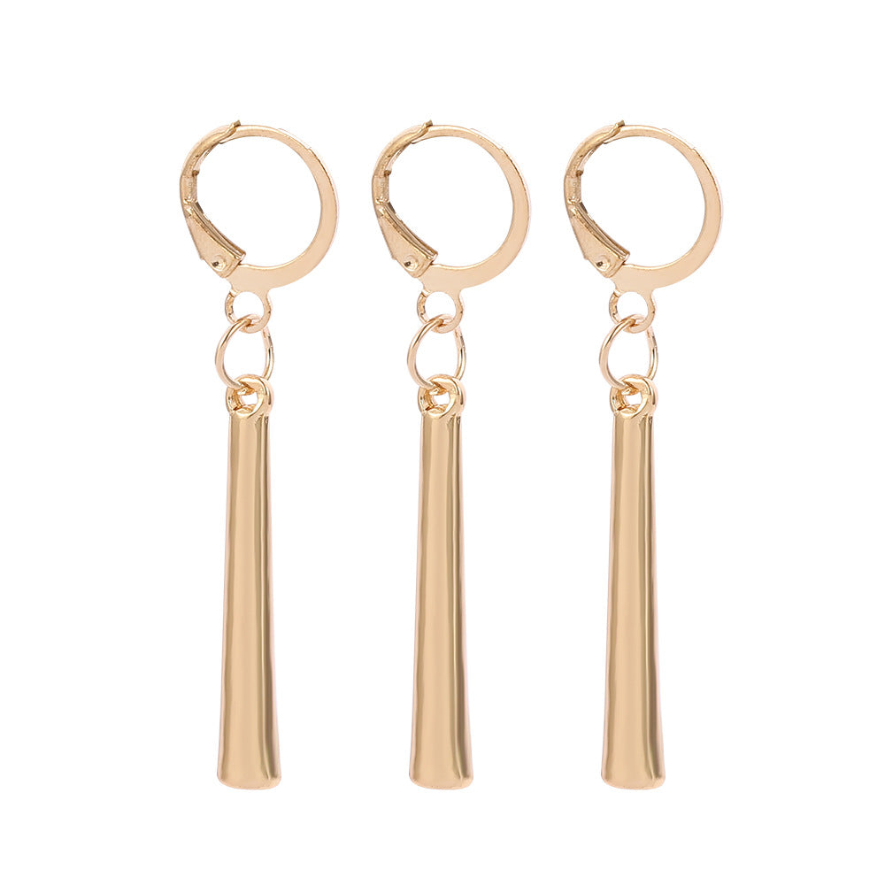 Detail of earring surface shine and polished gold finish