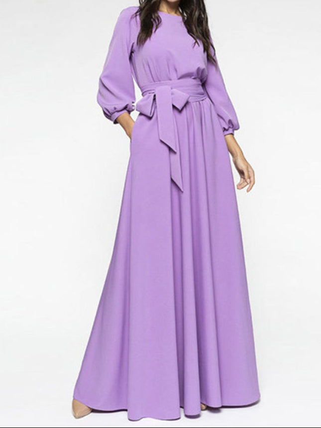 Close-up detail of lantern sleeve fabric and stitching on modest maxi dress