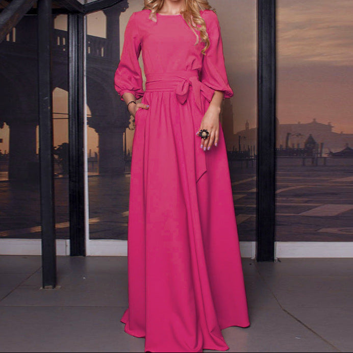 Three-quarter view of modest maxi dress showing lantern sleeve and skirt movement
