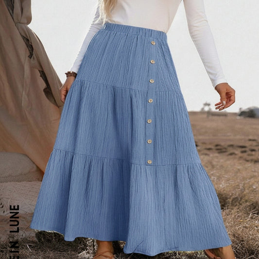 Burgundy tiered maxi skirt with flowing layers, modest casual style