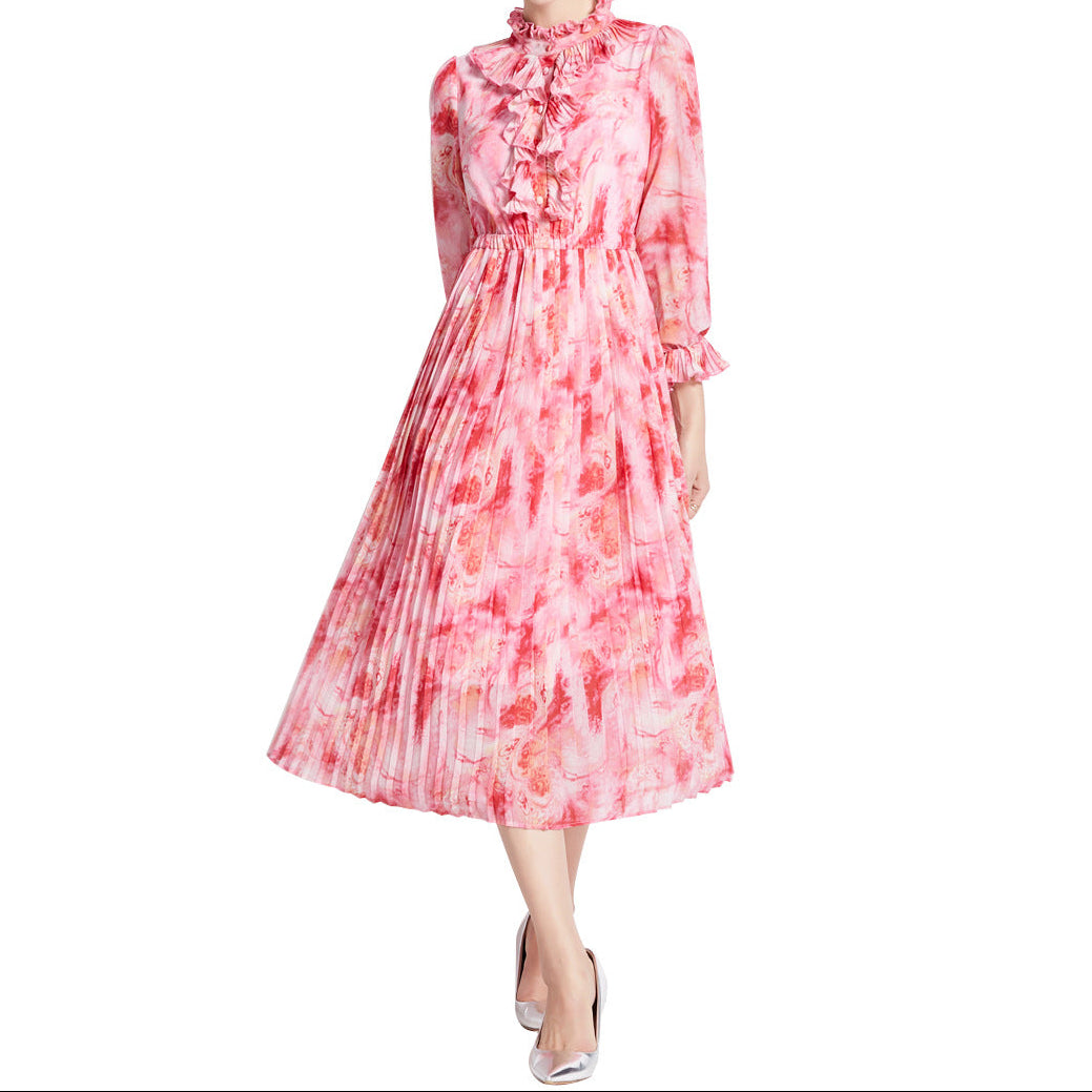 Side profile displaying the dress's graceful length and layered chiffon fabric