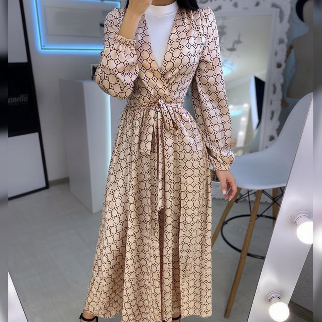 Back view of printed modest dress showing full length sleeves and relaxed fit