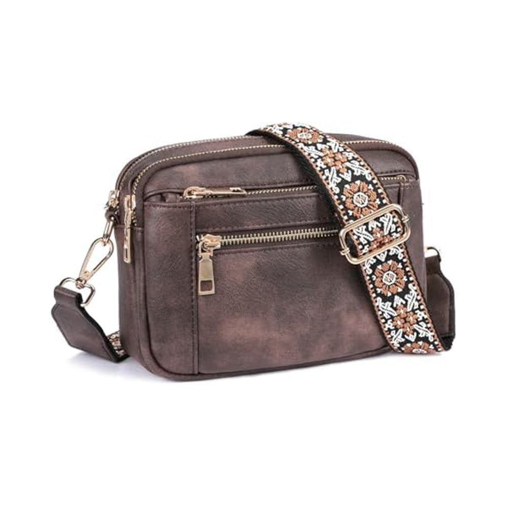 Front view with bag fully opened displaying organizational pockets inside