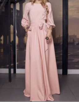 Neckline and shoulder detail of burgundy modest maxi dress with lantern sleeves