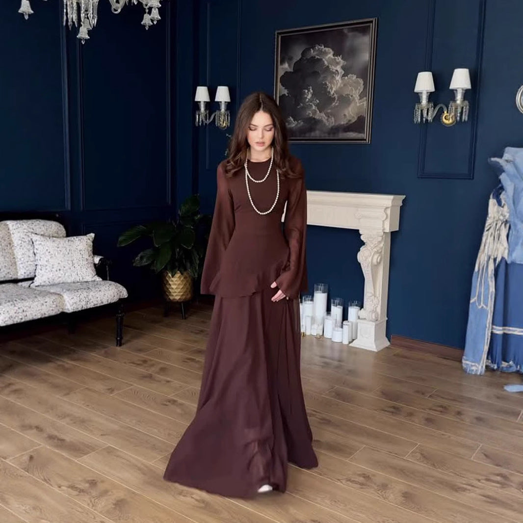 Full length view of the dress hem and flowing skirt portion