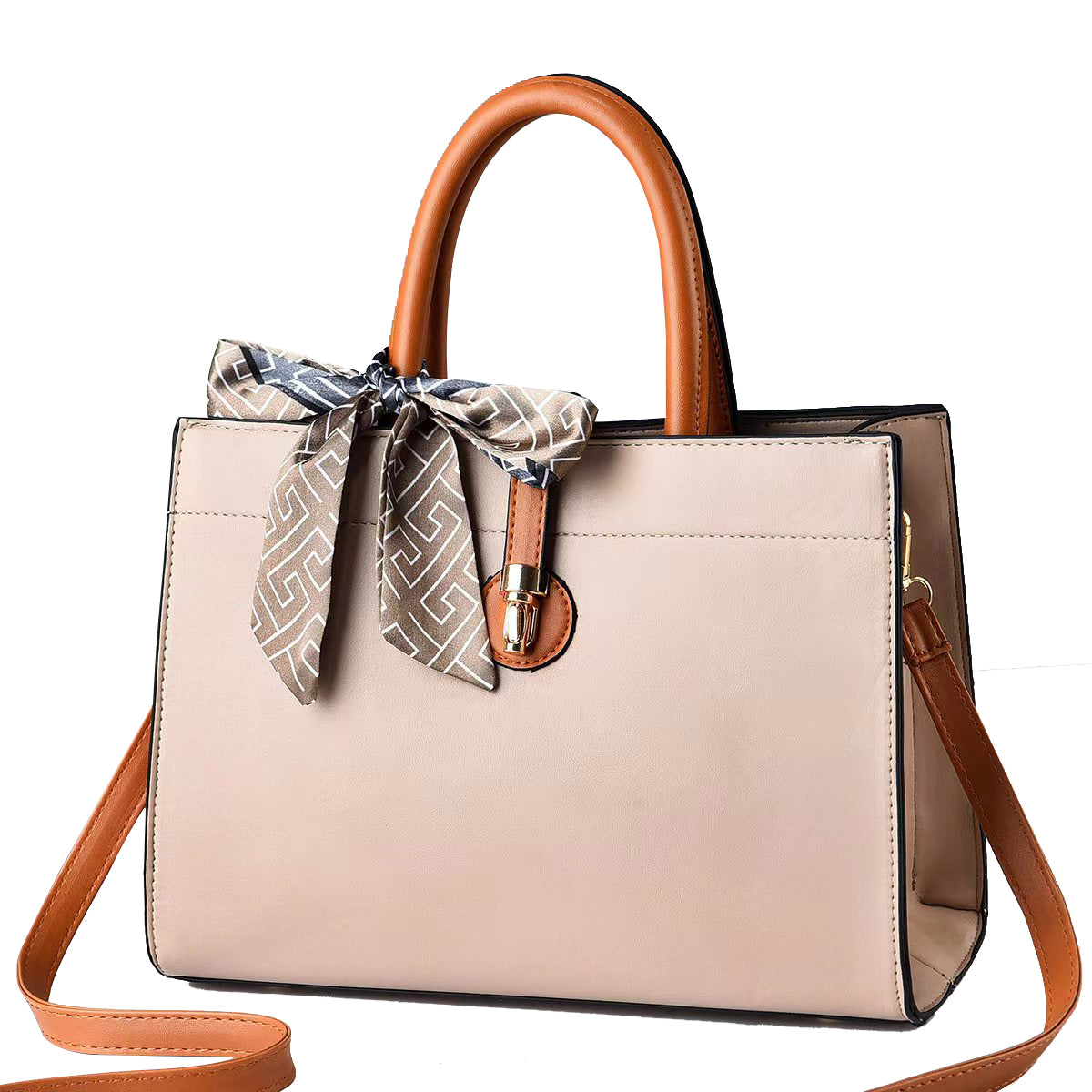 Close-up of tote bag's smooth leather texture and top handles