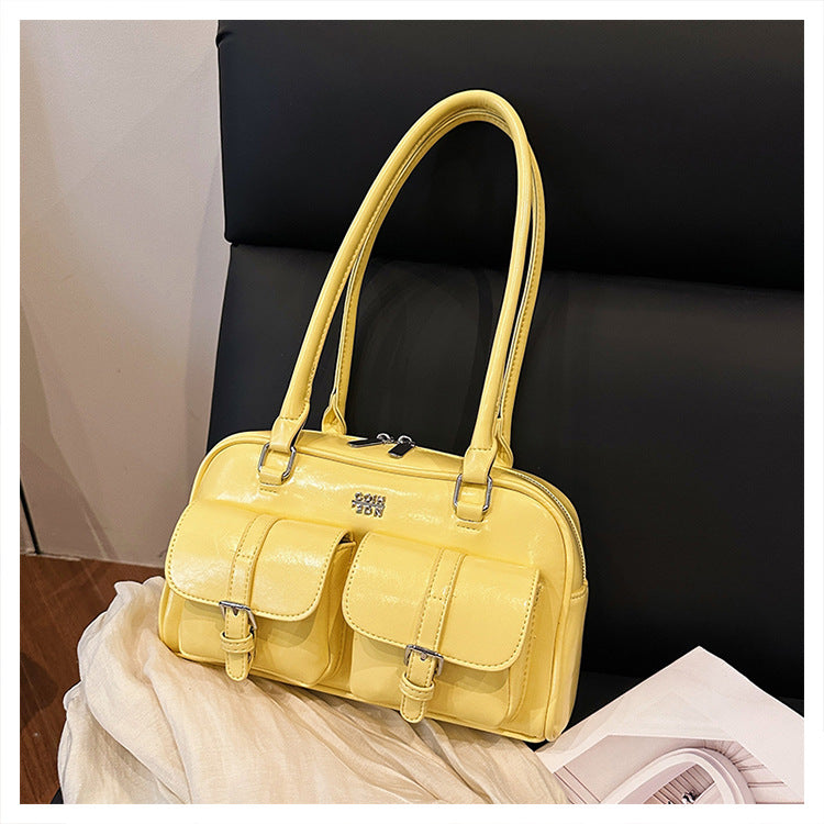 Bag shown from underneath highlighting structured base and silhouette
