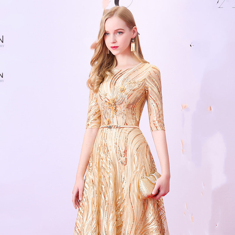 Side profile of modest dress highlighting fitted waist and floor-length hem
