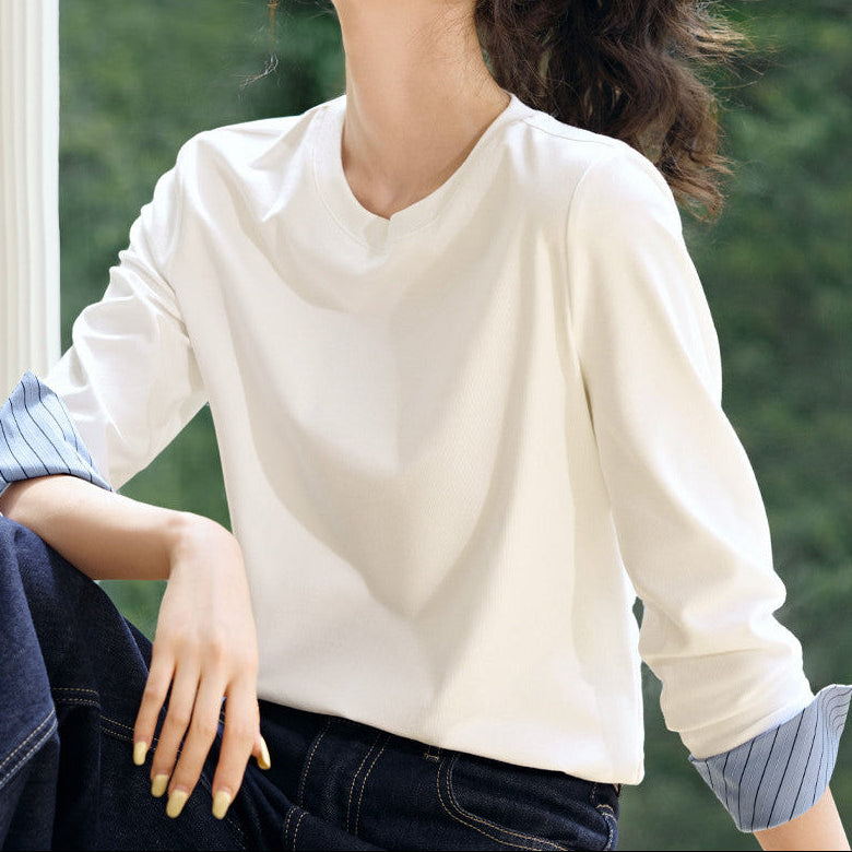 Front neckline detail of round neck striped patchwork long sleeve top