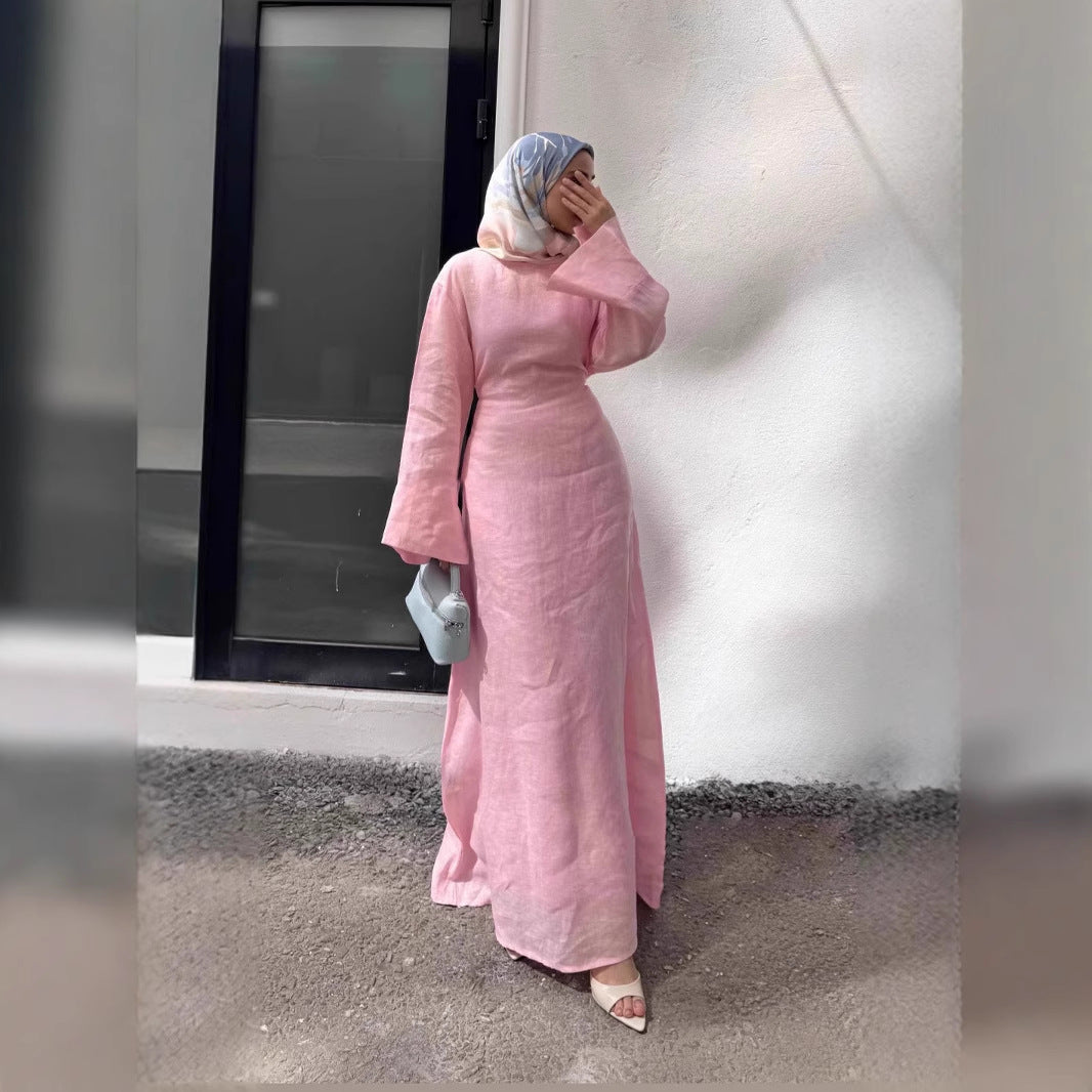 Side profile of dress highlighting flattering slimming cut and sleeve drape
