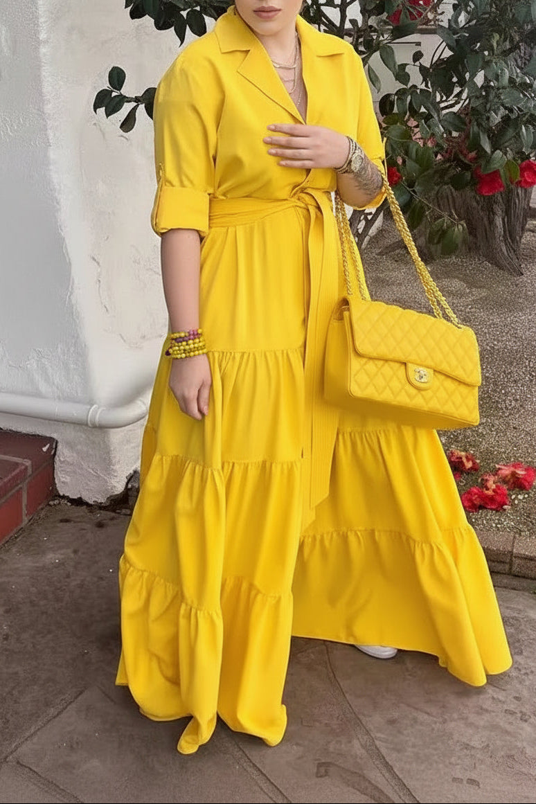 Side profile of womens dress highlighting modest cut and three-quarter sleeve length