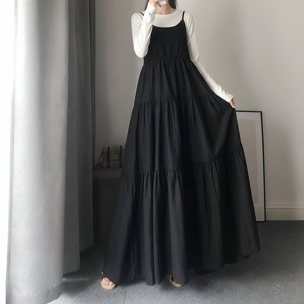 Black plus size maxi slip dress with thin straps, elegant evening wear