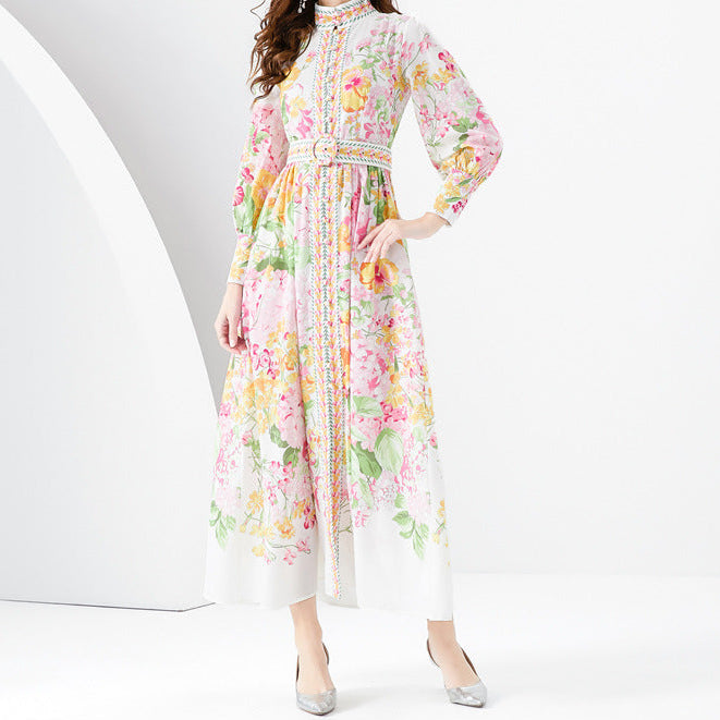 Close-up of vintage floral print pattern on dress fabric