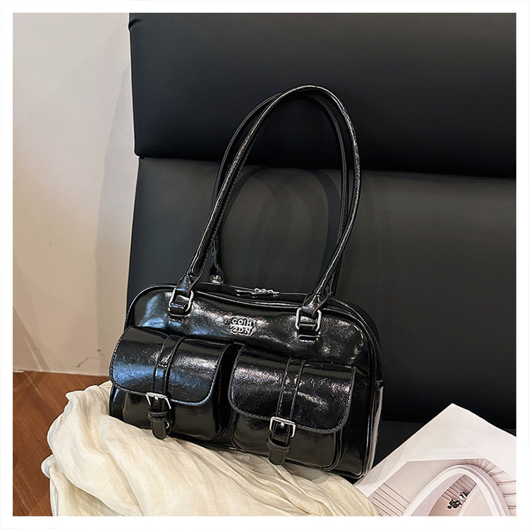 Detail of bag closure mechanism and hardware fastening