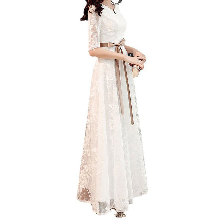 Side profile displaying modest length and fitted waist design