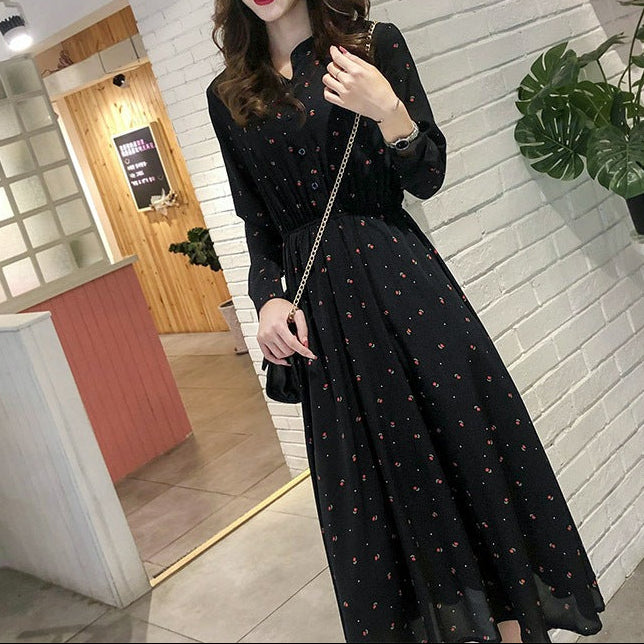 Close-up of delicate chiffon fabric texture and long sleeve detail on dress