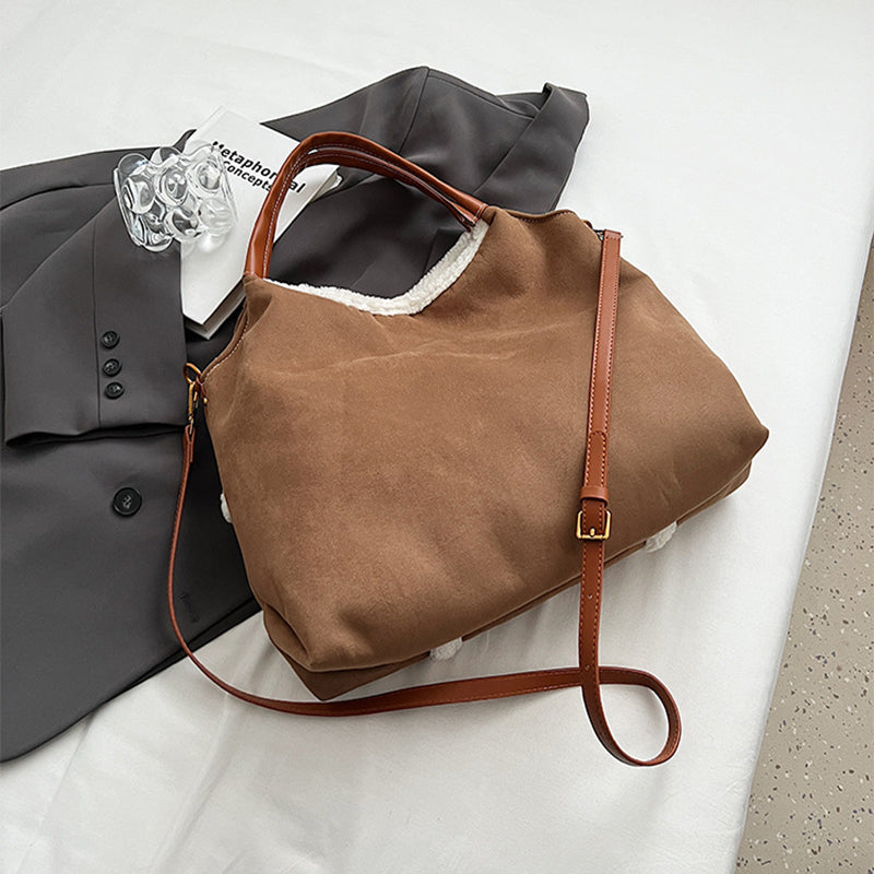 Side profile showing bag depth and handle construction