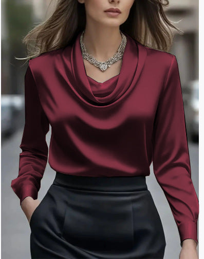 Flat lay showing neutral cream tone and structured long sleeves