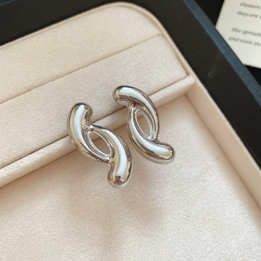 Back angle showing silver hoop earring design and closure mechanism