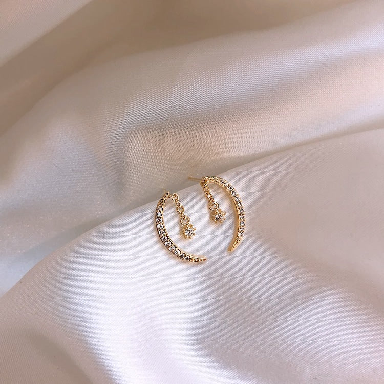 Silver zircon moon earrings with delicate crescent design for everyday wear