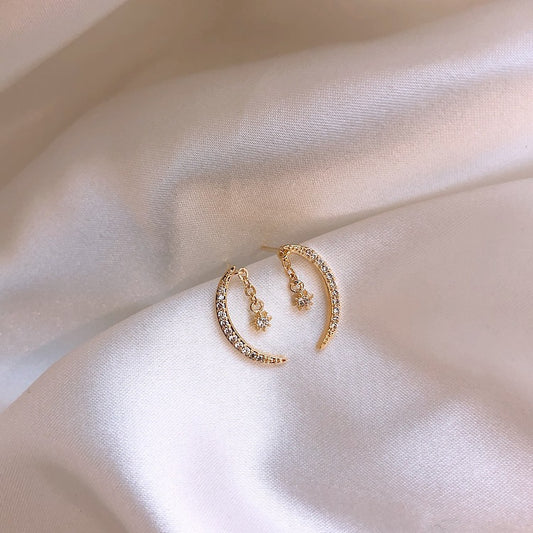 Silver zircon moon earrings with delicate crescent design for everyday wear