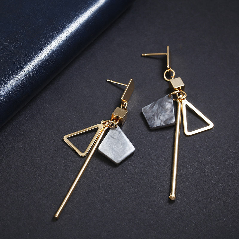 Back view displaying earring post and overall balanced symmetrical design