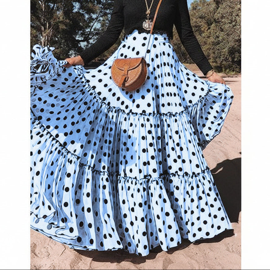 Close-up detail of white polka dot pattern on blue fabric