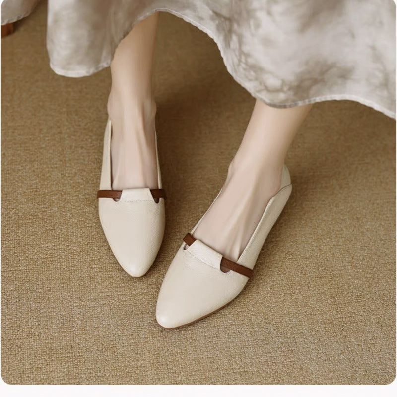 Side profile view showing curved heel and shoe silhouette