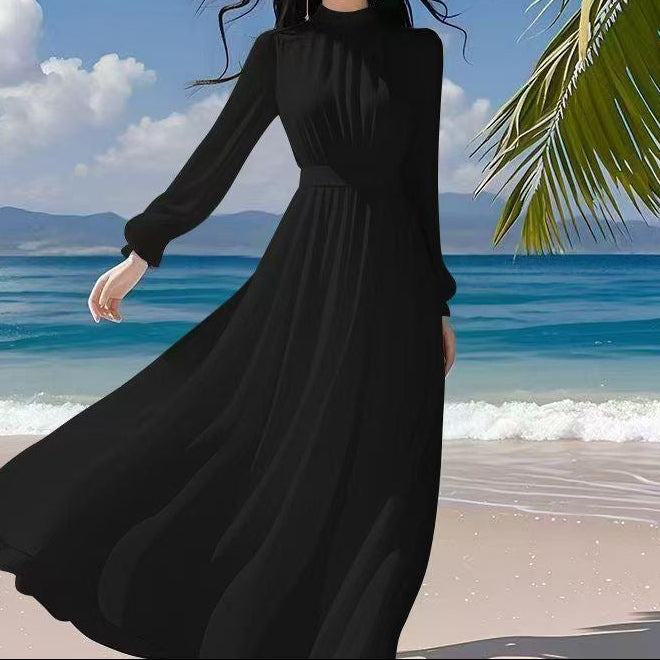 Back view of long-sleeved black maxi dress with elegant neckline