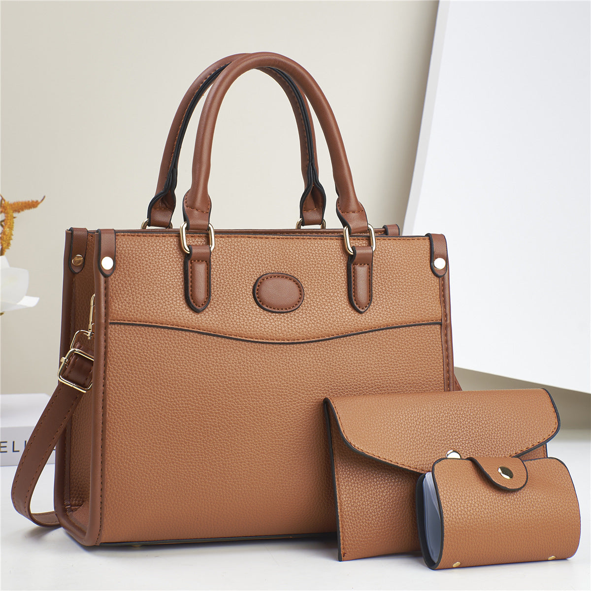 Styled shot of bags worn as shoulder bags in casual setting