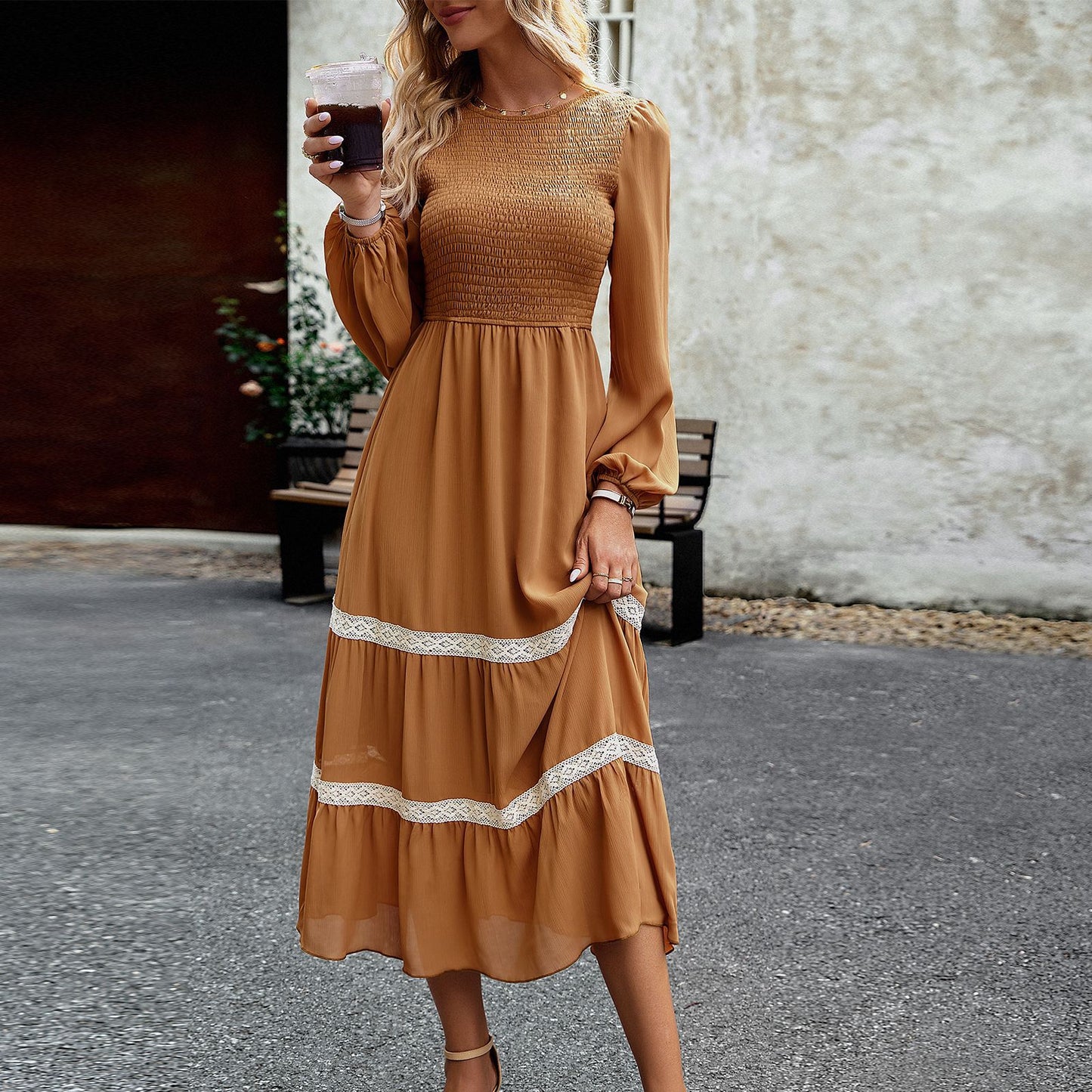 Side profile showcasing dress silhouette and lantern sleeve structure