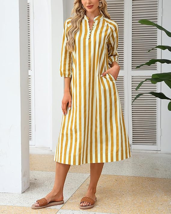 Close-up of lower hem and stripe continuation on dress