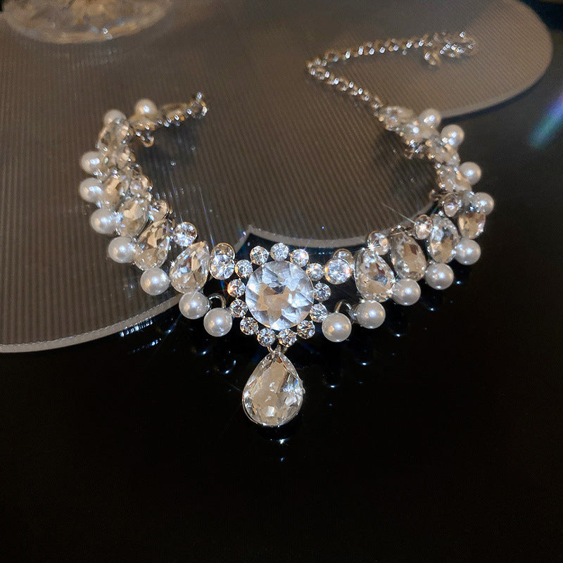 Necklace on dress form showing proper fit and drape on shoulders