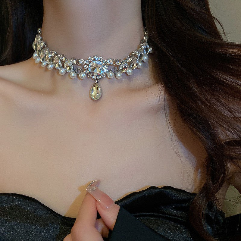 Close-up of pendant detail showing intricate craftsmanship and finish