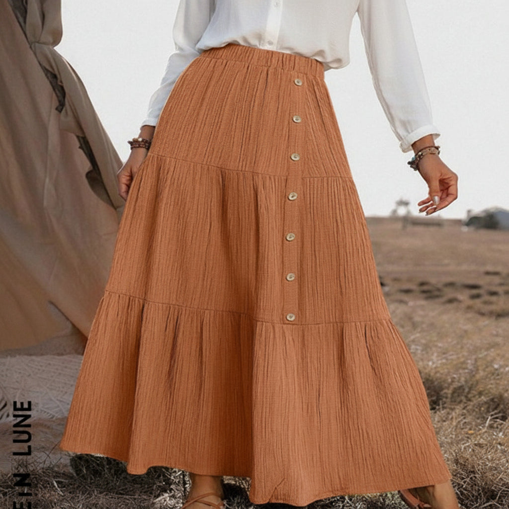 Close-up of layered fabric tiers showing texture and draping detail